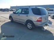 ✅ 1999 Mercedes-Benz M 320/430/500 • VIN: 4JGAB54E3XA100885 • Lot: 43853117. Listed on IAAI with 194,865 mi. Free auction sales archive from the USA and detailed vehicle history report at DreamBid. Image 3.