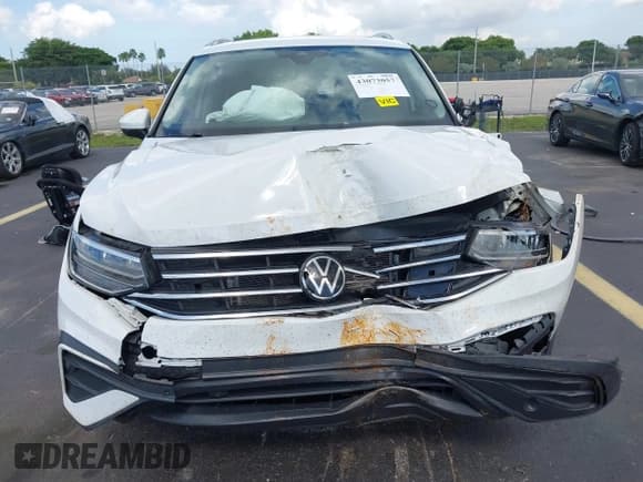 ✅ 2022 Volkswagen Tiguan SE • VIN: 3VV3B7AX1NM042582 • Lot: 43073057. Listed on IAAI with 28,724 mi. Free auction sales archive from the USA and detailed vehicle history report at DreamBid. Image 13.