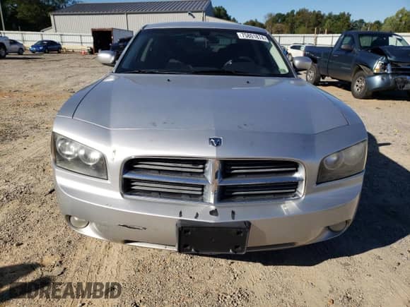 2010 Dodge Charger SXT z VIN 2B3CA3CV7AH285801, wystawiony jako Copart lot #75801874 z przebiegiem 221 337 mil mil oraz Szkoda całkowita • Salvage title. Historia ofert i sprzedaży dostępna na DreamBid. Obrazek 5.