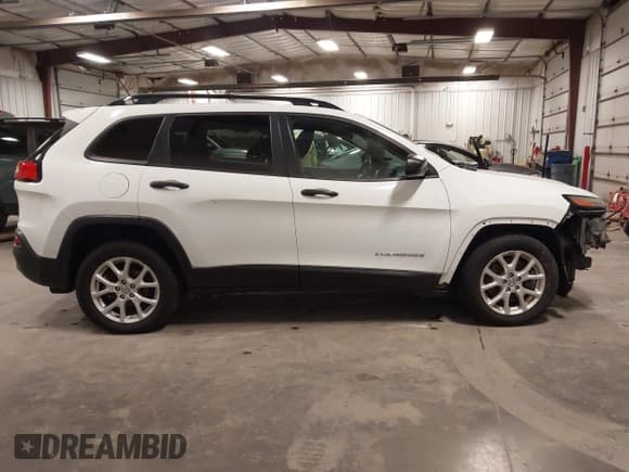 ✅ 2016 Jeep Cherokee Sport • VIN: 1C4PJLAB7GW212267 • Lot: 43614125. Listed on IAAI with 114,058 mi. Free auction sales archive from the USA and detailed vehicle history report at DreamBid. Image 14.