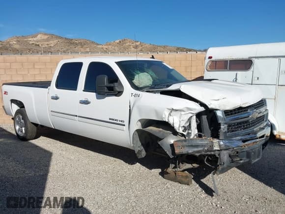 ✅ 2014 Chevrolet Silverado 2500HD LT • VIN: 1GC1CXCG5EF107871 • Lot: 43518202. Listed on IAAI with 74,569 mi. Free auction sales archive from the USA and detailed vehicle history report at DreamBid. Image 1.