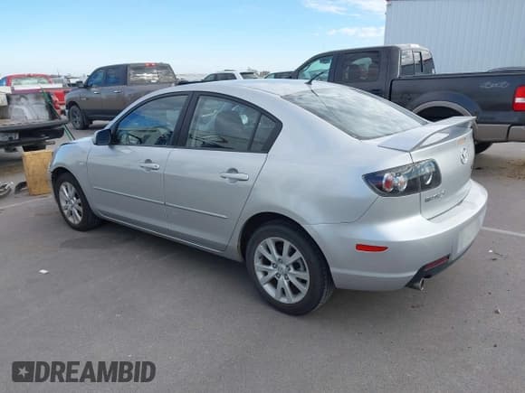 ✅ 2007 Mazda 3 i Touring • VIN: JM1BK32F971764732 • Lot: 43662483. Listed on IAAI with 86,889 mi. Free auction sales archive from the USA and detailed vehicle history report at DreamBid. Image 3.