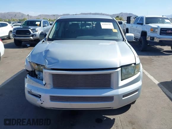 ✅ 2007 Honda Ridgeline RTS • VIN: 2HJYK16467H543402 • Lot: 42068582. Listed on IAAI with 232,067 mi. Free auction sales archive from the USA and detailed vehicle history report at DreamBid. Image 12.