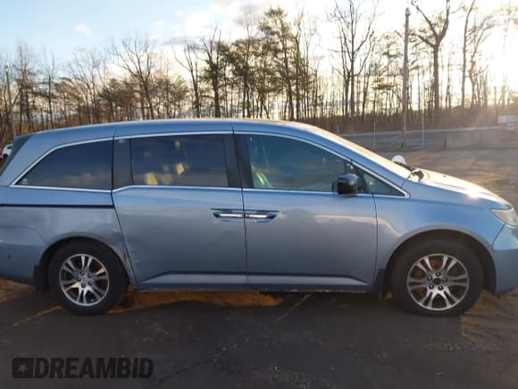 ✅ 2012 Honda Odyssey EX-L • VIN: 5FNRL5H64CB143706 • Lot: 43815237. Listed on IAAI with Not provided. Free auction sales archive from the USA and detailed vehicle history report at DreamBid. Image 12.