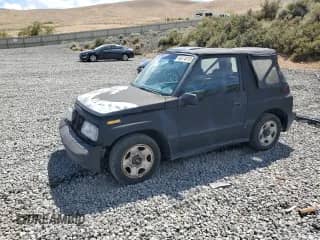 1996 Chevrolet Tracker с VIN 2CNBE186XT6919987, выставлен на аукционе Copart как лот 66674815 с пробегом 176 986 миль миль и Списание • Salvage title. История ставок и продаж доступна на DreamBid. Изображение 1.