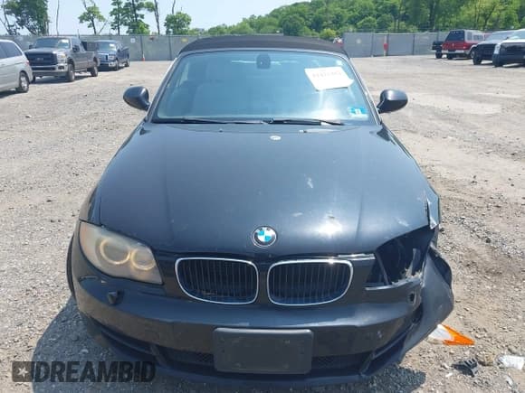 ✅ 2010 BMW 1 Series 128i • VIN: WBAUN1C55AVH81750 • Lot: 42411484. Listed on IAAI with 124,432 mi. Free auction sales archive from the USA and detailed vehicle history report at DreamBid. Image 12.