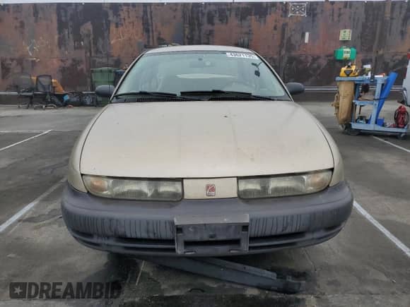 1996 Saturn SL с VIN 1G8ZF5289TZ274832, выставлен на аукционе Copart как лот 43621135 с пробегом 63 363 миль миль и Чистый • Clean title. История ставок и продаж доступна на DreamBid. Изображение 5.