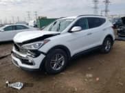 ✅ 2018 Hyundai Santa Fe 2.4L • VIN: 5NMZUDLB3JH065765 • Lot: 48708024. Wystawiony na Copart z przebiegiem 67 727 mil. Bezpłatny archiwum sprzedaży aukcyjnych z USA i szczegółowy raport historii pojazdu na DreamBid. Zdjęcie 1.