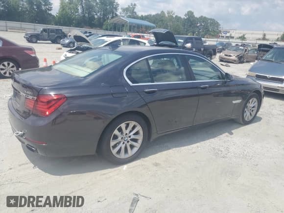 ✅ 2014 BMW 7 Series 740i • VIN: WBAYA6C58ED826649 • Lot: 66338525. Listed on Copart with 252,372 mi. Free auction sales archive from the USA and detailed vehicle history report at DreamBid. Image 3.