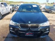 ✅ 2016 BMW X4 M40i • VIN: 5UXXW7C59G0M91223 • Lot: 42009394. Listed on IAAI with 144,771 mi. Free auction sales archive from the USA and detailed vehicle history report at DreamBid. Image 12.