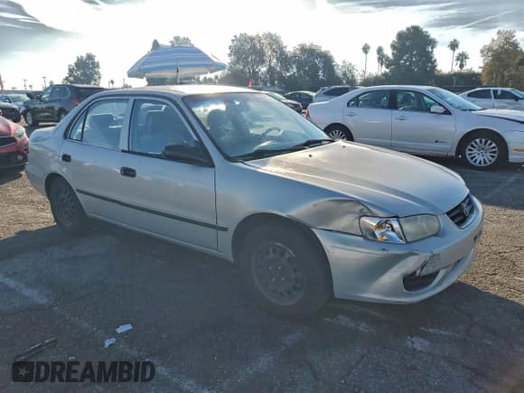 ✅ 2001 Toyota Corolla LE • VIN: 1NXBR12E81Z424786 • Lot: 93980485. Listed on Copart with 218,393 mi. Free auction sales archive from the USA and detailed vehicle history report at DreamBid. Image 4.