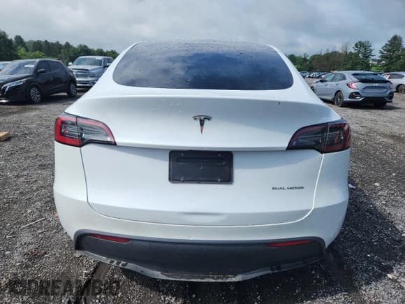 ✅ 2023 Tesla Model Y Long Range • VIN: 7SAYGDEE3PF702497 • Lot: 64995825. Listed on Copart with 24,676 mi. Free auction sales archive from the USA and detailed vehicle history report at DreamBid. Image 6.