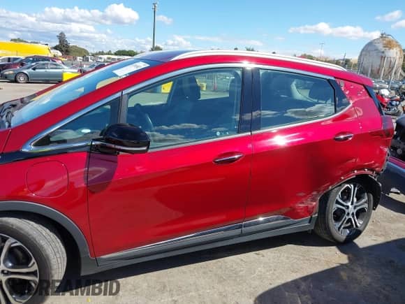 2021 Chevrolet Bolt EV Premier z VIN 1G1FZ6S06M4104855, wystawiony jako IAAI lot #43196582 z przebiegiem 57 167 mil mil oraz . Historia ofert i sprzedaży dostępna na DreamBid. Obrazek 15.