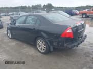 ✅ 2012 Ford Fusion Hybrid • VIN: 3FADP0L32CR157817 • Lot: 43842344. Listed on IAAI with 142,555 mi. Free auction sales archive from the USA and detailed vehicle history report at DreamBid. Image 3.