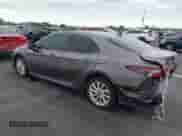 2022 Toyota Camry LE with VIN 4T1C11AK0NU653830, listed as a IAAI auction lot 43428154 with 21,960 mi miles and . Bid and sale history available at DreamBid. Image 3.