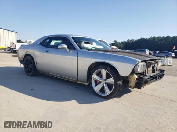 2009 Dodge Challenger SRT-8 z VIN 2B3LJ74W29H563241, wystawiony jako Copart lot #73367354 z przebiegiem Nie podano mil oraz Czysty tytuł • Clean title. Historia ofert i sprzedaży dostępna na DreamBid. Obrazek 4.