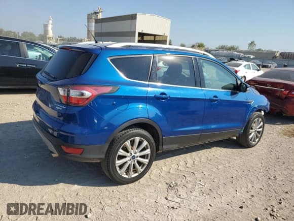 ✅ 2017 Ford Escape Titanium • VIN: 1FMCU0JDXHUA16497 • Lot: 84463635. Wystawiony na Copart z przebiegiem 112 225 mil. Bezpłatny archiwum sprzedaży aukcyjnych z USA i szczegółowy raport historii pojazdu na DreamBid. Zdjęcie 3.