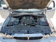 ✅ 2004 Jaguar XJ 8 • VIN: SAJEA71C34SG03026 • Лот: 60803165. Опубликован ранее на Copart с пробегом 96 219 миль. Бесплатный доступ к архиву аукционных продаж из США и подробный отчёт об истории автомобиля на DreamBid. Изображение 11.