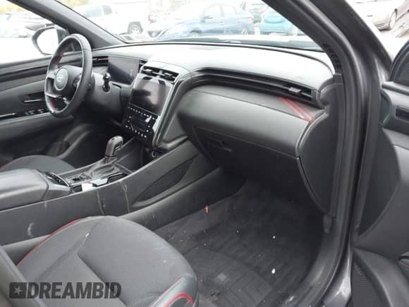 2023 Hyundai Tucson N Line with VIN KM8JFCAE2PU212623, listed as a IAAI auction lot 43440284 with 94,940 mi miles and . Bid and sale history available at DreamBid. Image 5.