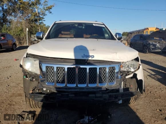 ✅ 2012 Jeep Grand Cherokee Overland • VIN: 1C4RJFCG3CC345994 • Lot: 86448425. Listed on Copart with 126,138 mi. Free auction sales archive from the USA and detailed vehicle history report at DreamBid. Image 5.