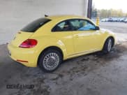 ✅ 2014 Volkswagen Beetle 1.8T • VIN: 3VWJ17AT0EM634932 • Lot: 43551070. Listed on IAAI with Not provided. Free auction sales archive from the USA and detailed vehicle history report at DreamBid. Image 4.