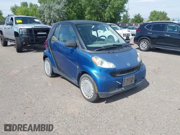 ✅ 2009 Smart fortwo Pure • VIN: WMEEJ31X49K309473 • Lot: 42714704. Listed on IAAI with 30,176 mi. Free auction sales archive from the USA and detailed vehicle history report at DreamBid. Image 1.