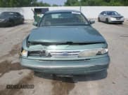 ✅ 1997 Ford Crown Victoria • VIN: 2FALP73W3VX232351 • Lot: 60196655. Wystawiony na Copart z przebiegiem 218 587 mil. Bezpłatny archiwum sprzedaży aukcyjnych z USA i szczegółowy raport historii pojazdu na DreamBid. Zdjęcie 5.