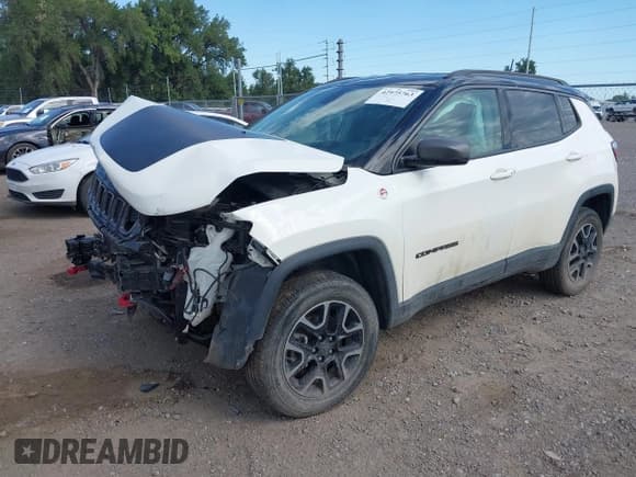 ✅ 2019 Jeep Compass Trailhawk • VIN: 3C4NJDDB3KT671092 • Lot: 42975763. Wystawiony na IAAI z przebiegiem 69 489 mil. Bezpłatny archiwum sprzedaży aukcyjnych z USA i szczegółowy raport historii pojazdu na DreamBid. Zdjęcie 2.