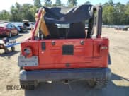 ✅ 2003 Jeep Wrangler Rubicon • VIN: 1J4FA69S43P373014 • Lot: 86863735. Listed on Copart with 120,127 mi. Free auction sales archive from the USA and detailed vehicle history report at DreamBid. Image 6.