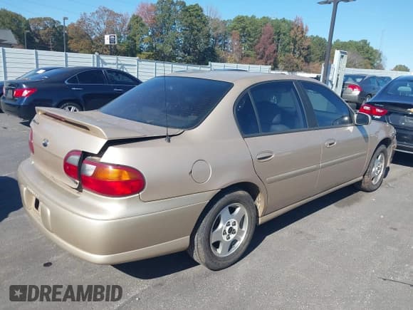 ✅ 2003 Chevrolet Malibu LS • VIN: 1G1NE52J33M615058 • Lot: 43684608. Listed on IAAI with 138,574 mi. Free auction sales archive from the USA and detailed vehicle history report at DreamBid. Image 4.