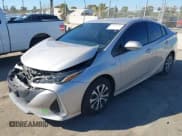 ✅ 2022 Toyota Prius XLE • VIN: JTDKAMFP1N3203339 • Lot: 43495592. Listed on IAAI with 59,866 mi. Free auction sales archive from the USA and detailed vehicle history report at DreamBid. Image 2.