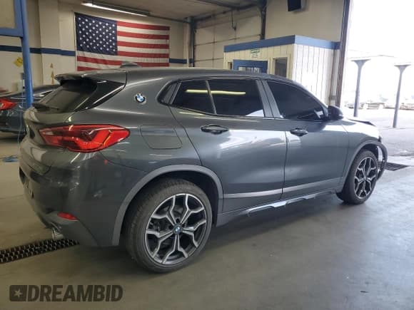 ✅ 2018 BMW X2 xDrive28i • VIN: WBXYJ5C30JEF77768 • Лот: 89852115. Опубликован ранее на Copart с пробегом 70 257 миль. Бесплатный доступ к архиву аукционных продаж из США и подробный отчёт об истории автомобиля на DreamBid. Изображение 3.