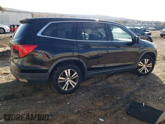 ✅ 2017 Honda Pilot EX-L • VIN: 5FNYF6H53HB095512 • Lot: 90895095. Listed on Copart with 129,428 mi. Free auction sales archive from the USA and detailed vehicle history report at DreamBid. Image 3.