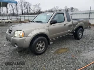 ✅ 2004 Nissan Frontier XE Desert Runner • VIN: 1N6ED26T34C460732 • Lot: 87469054. Listed on Copart with 184,837 mi. Free auction sales archive from the USA and detailed vehicle history report at DreamBid. Image 1.