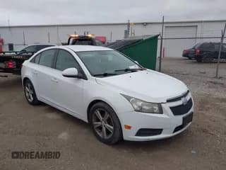 ✅ 2014 Chevrolet Cruze 2LT • VIN: 1G1PE5SB6E7360408 • Lot: 43812232. Listed on IAAI with 185,582 mi. Free auction sales archive from the USA and detailed vehicle history report at DreamBid. Image 1.
