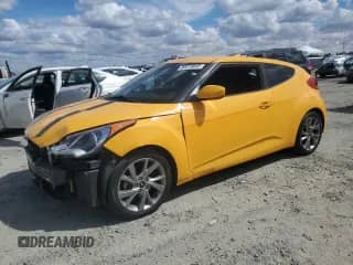 2017 Hyundai Veloster z VIN KMHTC6AD7HU308324, wystawiony jako Copart lot #80019845 z przebiegiem 156 850 mil mil oraz Szkoda całkowita • Salvage title. Historia ofert i sprzedaży dostępna na DreamBid. Obrazek 1.