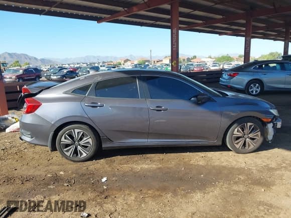 ✅ 2017 Honda Civic EX-L • VIN: 19XFC1F70HE032767 • Lot: 43013463. Wystawiony na IAAI z przebiegiem 162 072 mil. Bezpłatny archiwum sprzedaży aukcyjnych z USA i szczegółowy raport historii pojazdu na DreamBid. Zdjęcie 13.