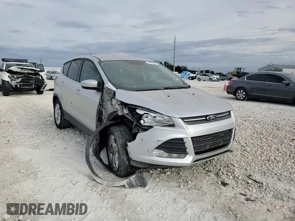 ✅ 2016 Ford Escape SE • VIN: 1FMCU0G77GUA09622 • Lot: 82742835. Listed on Copart with 68,614 mi. Free auction sales archive from the USA and detailed vehicle history report at DreamBid. Image 14.