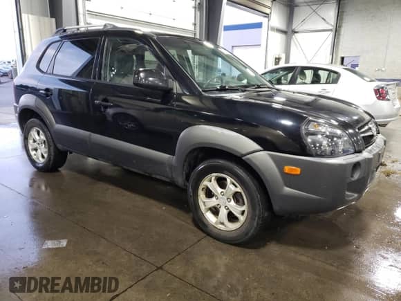 2009 Hyundai Tucson SE with VIN KM8JN12D79U114445, listed as a Copart auction lot 76508704 with 162,112 mi miles and Salvage title. Bid and sale history available at DreamBid. Image 4.