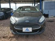 ✅ 2016 Ford Fiesta Titanium • VIN: 3FADP4FJ7GM138278 • Lot: 70993025. Wystawiony na Copart z przebiegiem 112 169 mil. Bezpłatny archiwum sprzedaży aukcyjnych z USA i szczegółowy raport historii pojazdu na DreamBid. Zdjęcie 5.