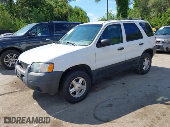 ✅ 2004 Ford Escape XLS • VIN: 1FMYU02184KA89044 • Lot: 43033932. Listed on IAAI with 211,537 mi. Free auction sales archive from the USA and detailed vehicle history report at DreamBid. Image 2.