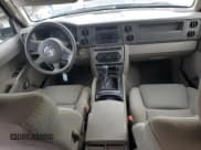 ✅ 2006 Jeep Commander • VIN: 1J8HG48K56C104463 • Lot: 67740515. Wystawiony na Copart z przebiegiem 100 019 mil. Bezpłatny archiwum sprzedaży aukcyjnych z USA i szczegółowy raport historii pojazdu na DreamBid. Zdjęcie 8.