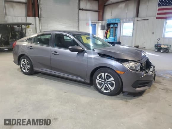 ✅ 2017 Honda Civic LX • VIN: 19XFC2F57HE230542 • Lot: 93558545. Wystawiony na Copart z przebiegiem 49 922 mil. Bezpłatny archiwum sprzedaży aukcyjnych z USA i szczegółowy raport historii pojazdu na DreamBid. Zdjęcie 4.