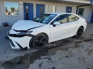 2025 Toyota Camry SE with VIN 4T1DAACK1SU013963, listed as a Copart auction lot 90329465 with 6,956 mi miles and Salvage title. Bid and sale history available at DreamBid. Image 1.