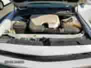 2013 Dodge Challenger SXT z VIN 2C3CDYAG4DH704333, wystawiony jako Copart lot #69514464 z przebiegiem 126 734 mil mil oraz Szkoda całkowita • Salvage title. Historia ofert i sprzedaży dostępna na DreamBid. Obrazek 11.