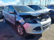 ✅ 2014 Ford Escape SE • VIN: 1FMCU9G94EUE57884 • Lot: 43670214. Listed on IAAI with 137,040 mi. Free auction sales archive from the USA and detailed vehicle history report at DreamBid. Image 1.