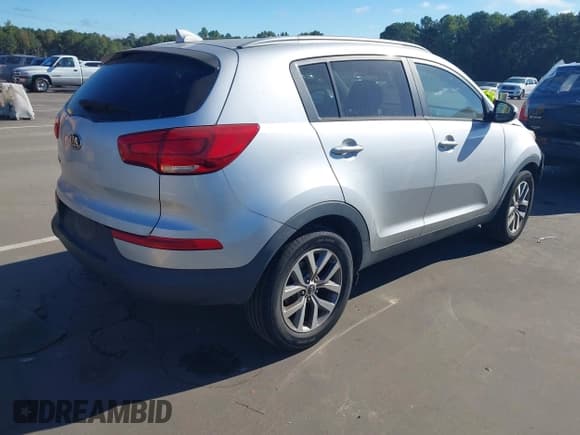 ✅ 2015 Kia Sportage LX • VIN: KNDPB3AC1F7710270 • Lot: 43248992. Listed on IAAI with 123,741 mi. Free auction sales archive from the USA and detailed vehicle history report at DreamBid. Image 4.
