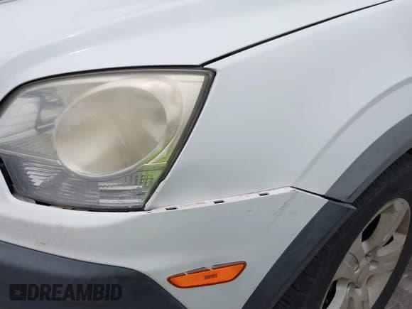 ✅ 2013 Chevrolet Captiva Sport LS • VIN: 3GNAL2EK2DS553868 • Lot: 42458380. Wystawiony na IAAI z przebiegiem 163 429 mil. Bezpłatny archiwum sprzedaży aukcyjnych z USA i szczegółowy raport historii pojazdu na DreamBid. Zdjęcie 6.