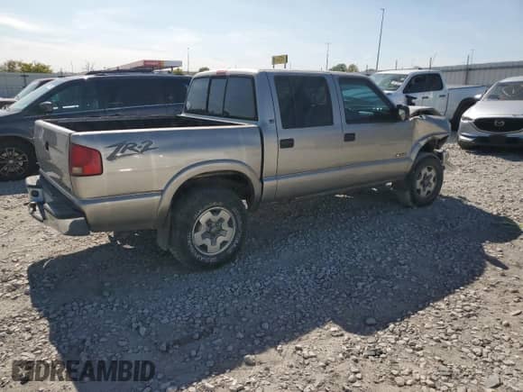 2002 Chevrolet S-10 LS с VIN 1GCDT13W32K207410, выставлен на аукционе Copart как лот 71834305 с пробегом Не указан миль и Списание • Salvage title. История ставок и продаж доступна на DreamBid. Изображение 3.