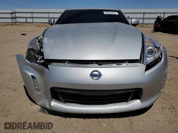 ✅ 2014 Nissan 370Z • VIN: JN1AZ4EHXEM636041 • Лот: 60835255. Опубликован ранее на Copart с пробегом 69 676 миль. Бесплатный доступ к архиву аукционных продаж из США и подробный отчёт об истории автомобиля на DreamBid. Изображение 5.